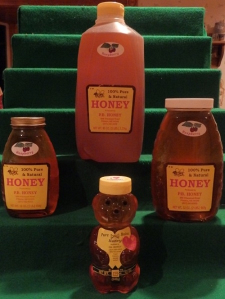 a picture of all the kinds of raspberry honey we have